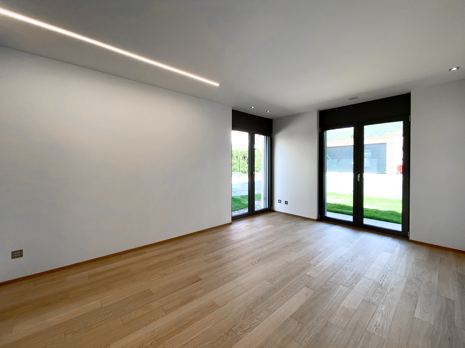 4,5-Zimmer-Wohnung mit Garten in Comano in einer eleganten neuen Residenz zu verkaufen